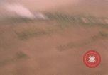 Image of aerial views of napalm bomb explosions in Vietnam War Vietnam, 1962, second 25 stock footage video 65675075352