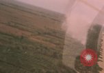 Image of aerial views of napalm bomb explosions in Vietnam War Vietnam, 1962, second 27 stock footage video 65675075352