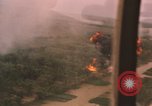 Image of aerial views of napalm bomb explosions in Vietnam War Vietnam, 1962, second 34 stock footage video 65675075352