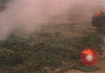 Image of aerial views of napalm bomb explosions in Vietnam War Vietnam, 1962, second 35 stock footage video 65675075352