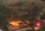 Image of aerial views of napalm bomb explosions in Vietnam War Vietnam, 1962, second 37 stock footage video 65675075352