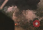 Image of aerial views of napalm bomb explosions in Vietnam War Vietnam, 1962, second 40 stock footage video 65675075352