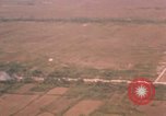 Image of aerial views of napalm bomb explosions in Vietnam War Vietnam, 1962, second 44 stock footage video 65675075352
