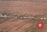 Image of aerial views of napalm bomb explosions in Vietnam War Vietnam, 1962, second 45 stock footage video 65675075352