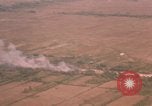 Image of aerial views of napalm bomb explosions in Vietnam War Vietnam, 1962, second 47 stock footage video 65675075352