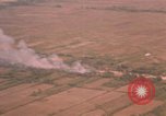 Image of aerial views of napalm bomb explosions in Vietnam War Vietnam, 1962, second 48 stock footage video 65675075352