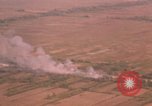 Image of aerial views of napalm bomb explosions in Vietnam War Vietnam, 1962, second 49 stock footage video 65675075352