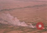 Image of aerial views of napalm bomb explosions in Vietnam War Vietnam, 1962, second 51 stock footage video 65675075352