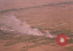 Image of aerial views of napalm bomb explosions in Vietnam War Vietnam, 1962, second 52 stock footage video 65675075352