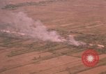 Image of aerial views of napalm bomb explosions in Vietnam War Vietnam, 1962, second 53 stock footage video 65675075352