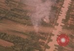 Image of aerial views of napalm bomb explosions in Vietnam War Vietnam, 1962, second 54 stock footage video 65675075352