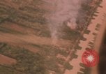 Image of aerial views of napalm bomb explosions in Vietnam War Vietnam, 1962, second 55 stock footage video 65675075352