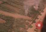 Image of aerial views of napalm bomb explosions in Vietnam War Vietnam, 1962, second 56 stock footage video 65675075352