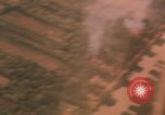 Image of aerial views of napalm bomb explosions in Vietnam War Vietnam, 1962, second 57 stock footage video 65675075352