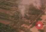 Image of aerial views of napalm bomb explosions in Vietnam War Vietnam, 1962, second 59 stock footage video 65675075352