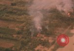 Image of aerial views of napalm bomb explosions in Vietnam War Vietnam, 1962, second 60 stock footage video 65675075352