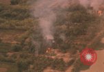 Image of aerial views of napalm bomb explosions in Vietnam War Vietnam, 1962, second 61 stock footage video 65675075352