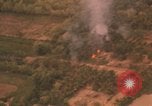 Image of aerial views of napalm bomb explosions in Vietnam War Vietnam, 1962, second 62 stock footage video 65675075352