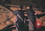Image of Vietnam Air Force mechanics Vietnam, 1962, second 36 stock footage video 65675075368
