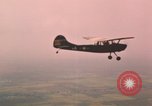Standbild O-1E Bird Dog Flugzeuge Tan ein Vietnam, 1962, aus Sekunde 7 historischem Filmmaterial Videoclip 65675075377