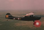Standbild O-1E Bird Dog Flugzeuge Tan ein Vietnam, 1962, aus Sekunde 32 historischem Filmmaterial Videoclip 65675075377
