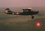 Standbild O-1E Bird Dog Flugzeuge Tan ein Vietnam, 1962, aus Sekunde 39 historischem Filmmaterial Videoclip 65675075377