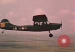 Standbild O-1E Bird Dog Flugzeuge Tan ein Vietnam, 1962, aus Sekunde 43 historischem Filmmaterial Videoclip 65675075377
