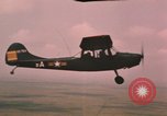 Standbild O-1E Bird Dog Flugzeuge Tan ein Vietnam, 1962, aus Sekunde 44 historischem Filmmaterial Videoclip 65675075377