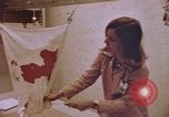 Image of blood stained clothing United States USA, 1969, second 7 stock footage video 65675075429