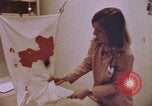 Image of blood stained clothing United States USA, 1969, second 9 stock footage video 65675075429