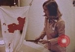 Image of blood stained clothing United States USA, 1969, second 11 stock footage video 65675075429