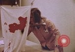 Image of blood stained clothing United States USA, 1969, second 12 stock footage video 65675075429