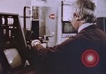 Image of crime laboratory analyst United States USA, 1969, second 21 stock footage video 65675075434