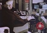Image of crime laboratory analyst United States USA, 1969, second 26 stock footage video 65675075434