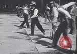 Image of horseshoe tossers Chicago Illinois USA, 1930, second 10 stock footage video 65675075490