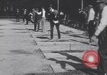 Image of horseshoe tossers Chicago Illinois USA, 1930, second 16 stock footage video 65675075490