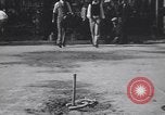 Image of horseshoe tossers Chicago Illinois USA, 1930, second 54 stock footage video 65675075490