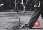 Image of horseshoe tossers Chicago Illinois USA, 1930, second 55 stock footage video 65675075490