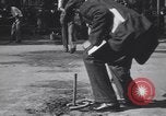 Image of horseshoe tossers Chicago Illinois USA, 1930, second 56 stock footage video 65675075490