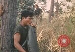 Image of Montagnard soldiers Pleiku South Vietnam, 1969, second 4 stock footage video 65675075556
