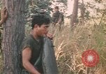 Image of Montagnard soldiers Pleiku South Vietnam, 1969, second 8 stock footage video 65675075556