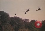 Image of UH-1D Iroquois helicopters Pleiku South Vietnam, 1969, second 18 stock footage video 65675075563