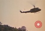 Image of UH-1D Iroquois helicopters Pleiku South Vietnam, 1969, second 30 stock footage video 65675075563