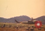Image of UH-1D Iroquois helicopters Pleiku South Vietnam, 1969, second 44 stock footage video 65675075563