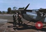 Image of O-1 Bird Dog liaison aircraft Bien Hoa Vietnam, 1970, second 59 stock footage video 65675075600