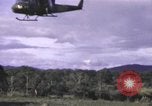 Standbild UH-1F Iroquois Hubschrauber Vietnam, 1968, aus Sekunde 55 historischem Filmmaterial Videoclip 65675075604
