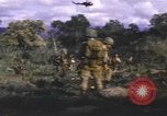 Standbild UH-1F Iroquois Hubschrauber Vietnam, 1968, aus Sekunde 62 historischem Filmmaterial Videoclip 65675075604