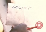 Image of U.S. and Montagnard troops parachute from CH-3E helicopter Vietnam, 1967, second 3 stock footage video 65675075610