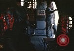 Image of U.S. and Montagnard troops parachute from CH-3E helicopter Vietnam, 1967, second 6 stock footage video 65675075610