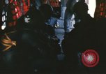 Image of U.S. and Montagnard troops parachute from CH-3E helicopter Vietnam, 1967, second 16 stock footage video 65675075610